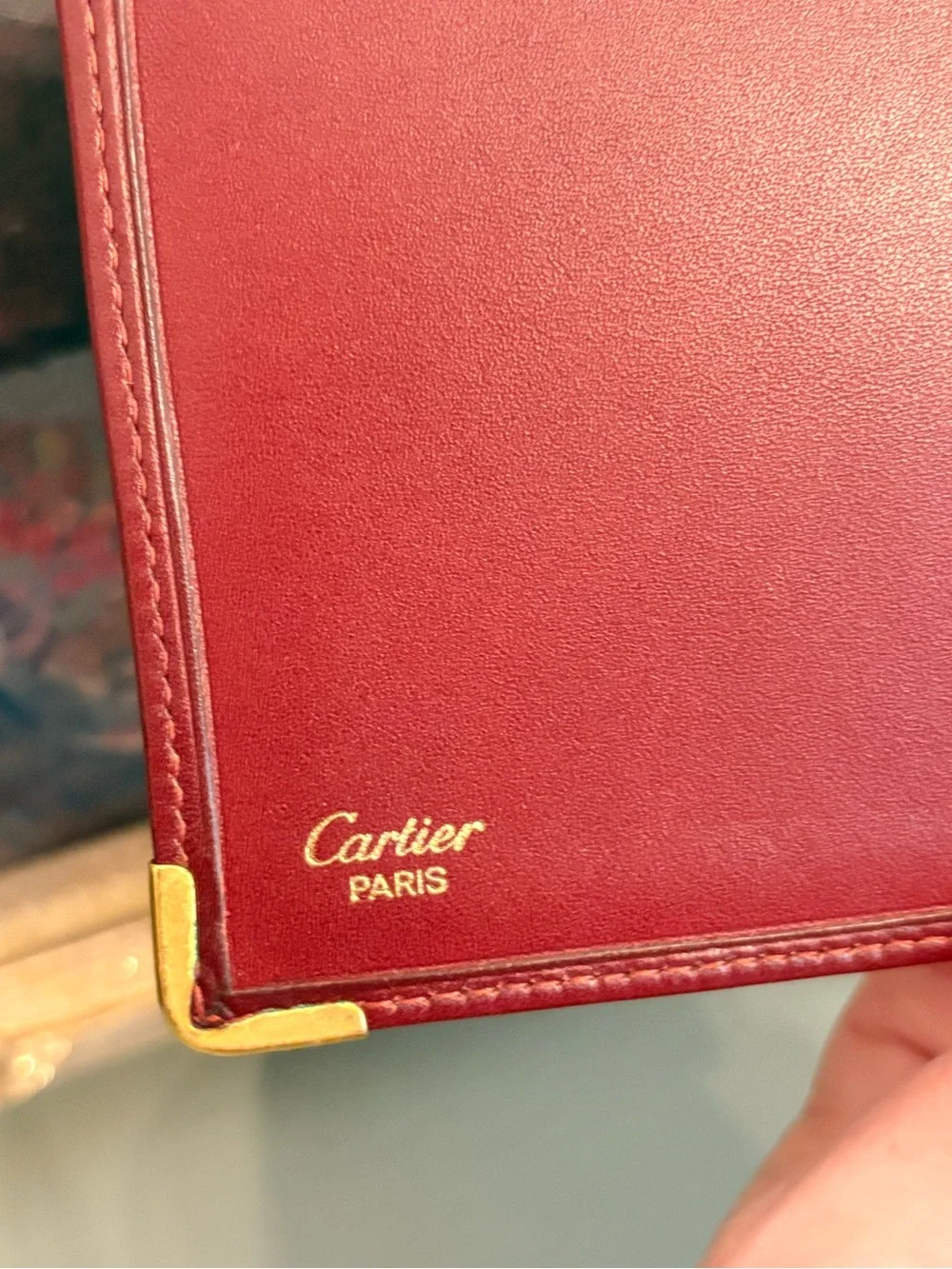 Cartier Burgundy Leather Men's Wallet with Gold Corner Accents